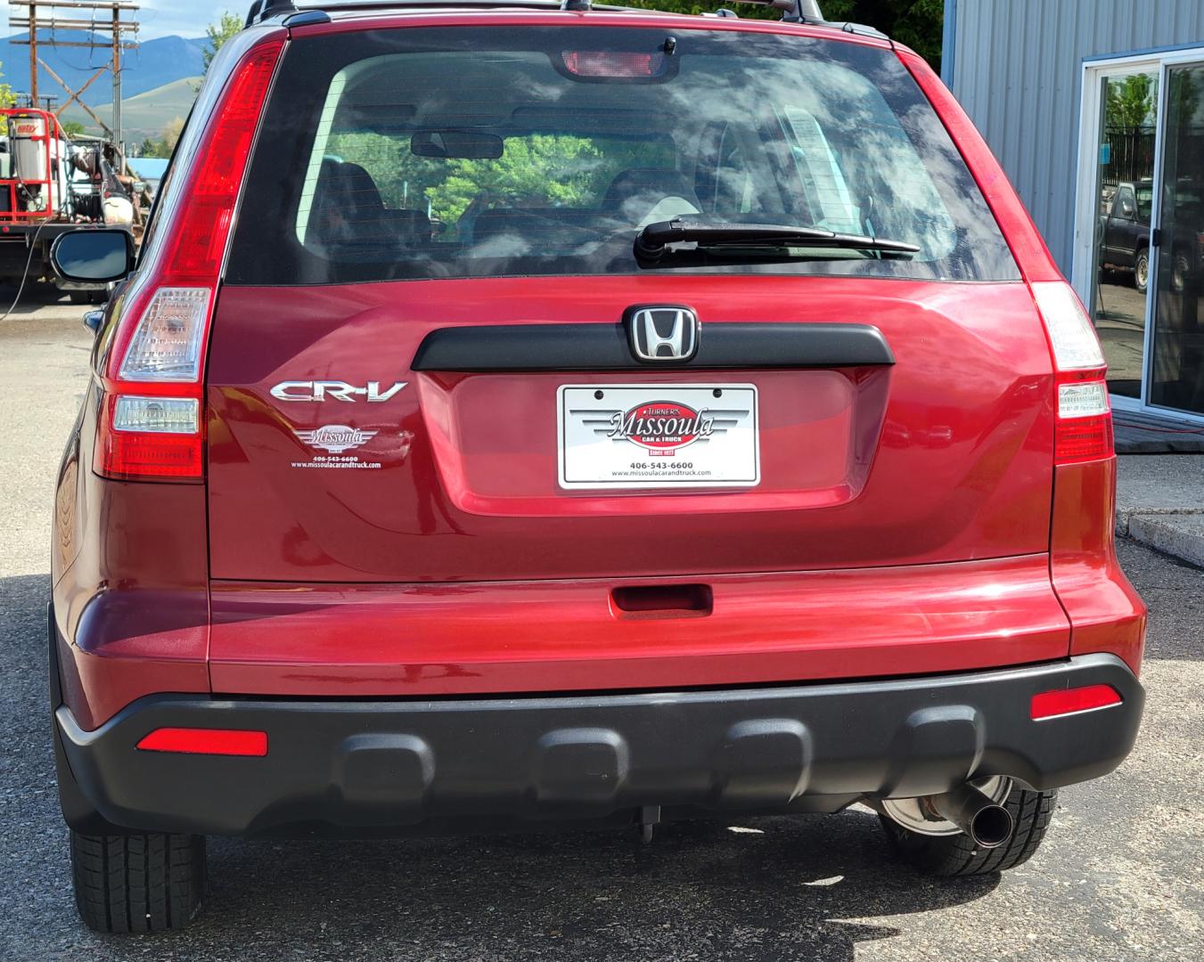 2009 Red /Gray Honda CR-V LX (5J6RE483X9L) with an 2.4L L4 engine, 5 Speed Automatic transmission, located at 450 N Russell, Missoula, MT, 59801, (406) 543-6600, 46.874496, -114.017433 - Great Running AWD SUV. 2.4L I4 Engine. 5 Speed Automatic Transmission. Air. Cruise. Tilt. Power Windows and Locks. New Tires. Roof Rack. Does have a Rebuilt Title so financing is not available. - Photo#6